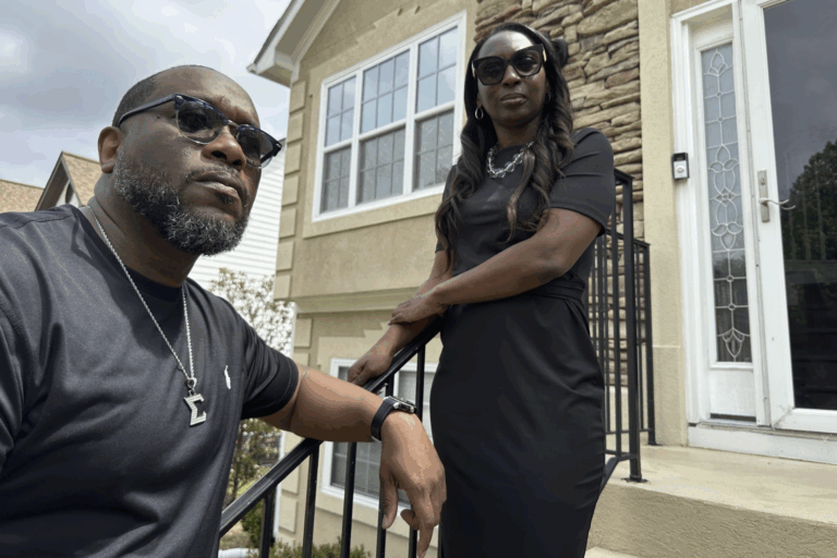 Toi Cliatt, left, and Trina Martin stand outside the home which the FBI mistakenly raided in 2017, in Atlanta on Friday, April 25, 2025. (AP Photo/Sudhin Thanawala)